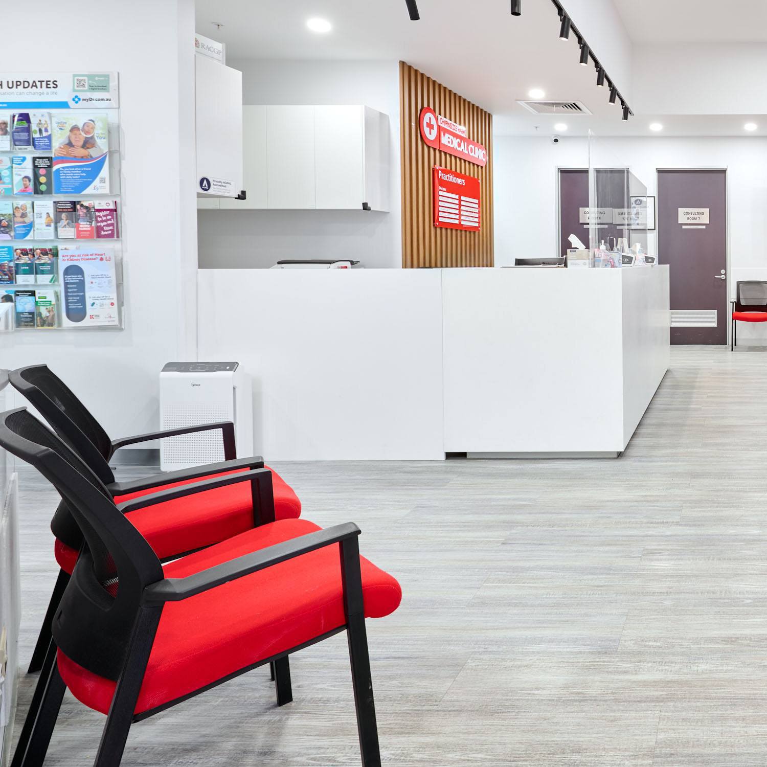 Chirnside Park medical clinic reception fit-out with white front desk and waiting chair